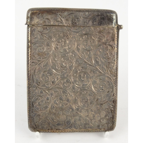 101 - Large silver card case with floral chased decoration, W.N Chester 1898-99, 10.5cm high