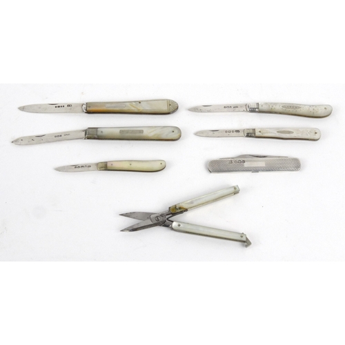 117 - Five silver and mother of pearl fruit knives, silver cased pocket knife and a pair of folding mother... 