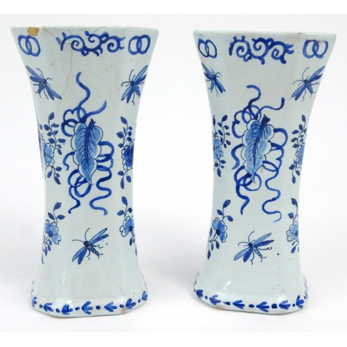 733 - Pair of Dutch Delft pottery vases hand painted with panels sailing boats and flowers, 14.5cm high