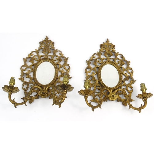 13 - Pair of Victorian gilt brass girondelle mirrors with floral scrolls  each 35cm high