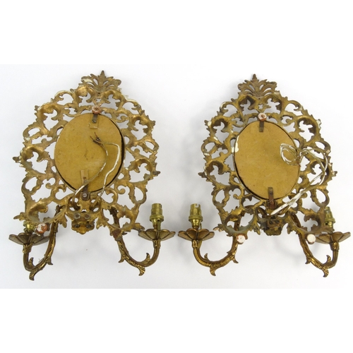 13 - Pair of Victorian gilt brass girondelle mirrors with floral scrolls  each 35cm high