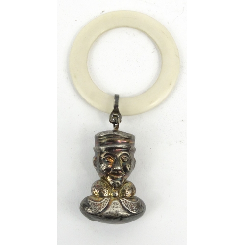 86 - Novelty silver bust baby's rattle with teething ring, C&N Birmingham 1951-52