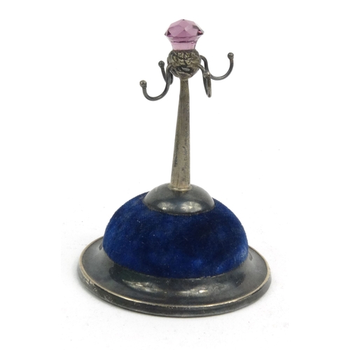 82 - Novelty silver ring stand/pincushion, hallmarked R.P Birmingham 1910-11, 8.5cm high