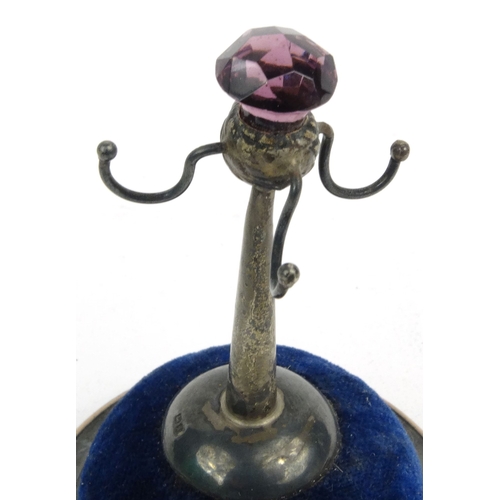 82 - Novelty silver ring stand/pincushion, hallmarked R.P Birmingham 1910-11, 8.5cm high