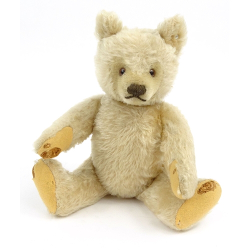 537 - Vintage Steiff straw filled teddy bear with jointed limbs and growler, stud to the ear, 33cm high