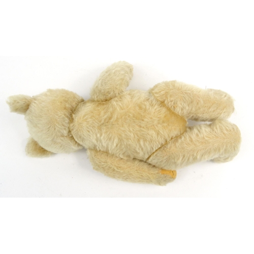 537 - Vintage Steiff straw filled teddy bear with jointed limbs and growler, stud to the ear, 33cm high