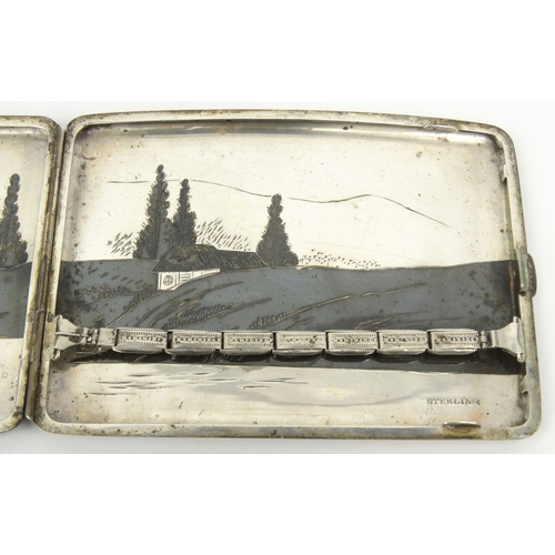 584 - Oriental Japanese sterling silver cigarette case decorated with landscape scenes, 11cm diameter