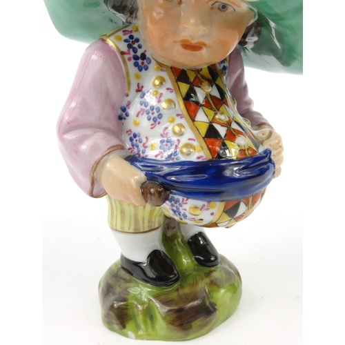 694 - Hand painted porcelain Mansion House dwarf with a portly belly, 'Country Resident to be Sold by Auct... 