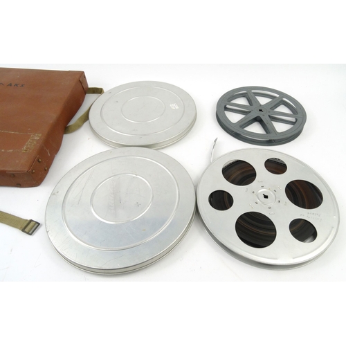 209 - Two ciné reels in Military hard cases including 1950's 60's monachy