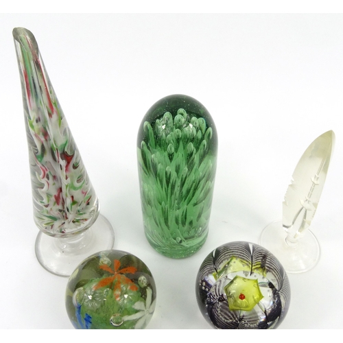 762 - Selection of assorted paperweights and paperweight-ended bottle openers including a Caithness exampl... 