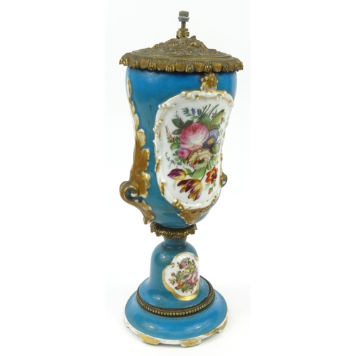 720 - Continental porcelain table lamp hand painted with panels of flowers, with gilt metal mounts, 38cm h... 