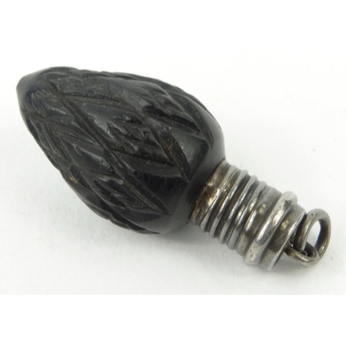 97 - Miniature Victorian carved wooden scent bottle with unmarked silver screw top, 3cm diameter