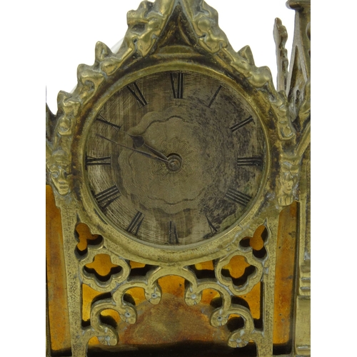 1115 - Brass Gothic style mantel clock, the movement 'Sal Muckasarsie London' to back, 18cm high