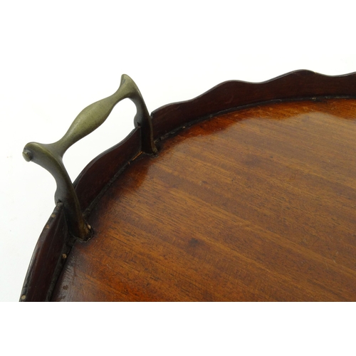 46 - Large Victorian mahogany tray with shell inlay and piecrust edge, 73cm long
