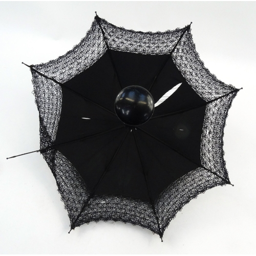 144 - Vintage lady's black silk parasol, 103cm long