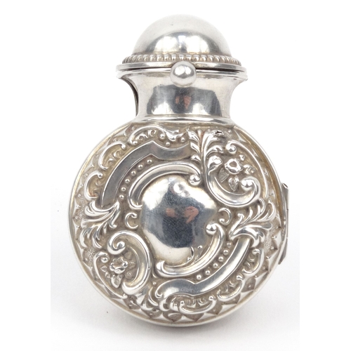 90 - Embossed silver cased glass scent bottle, hallmarked Birmingham 1901-02, 7cm high