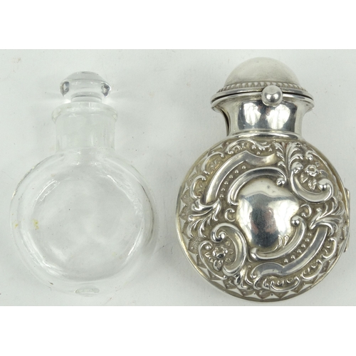 90 - Embossed silver cased glass scent bottle, hallmarked Birmingham 1901-02, 7cm high