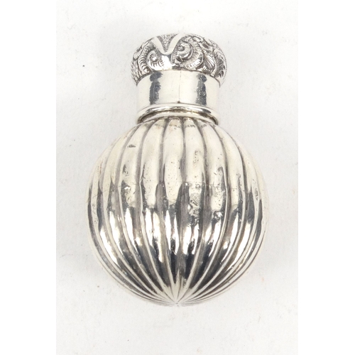 92 - Silver globular scent bottle with embossed decoration, Birmingham hallmarked, 5.5cm high