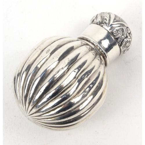 92 - Silver globular scent bottle with embossed decoration, Birmingham hallmarked, 5.5cm high