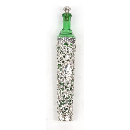 95 - Silver cased green glass bottle with embossed and pierced decoration, S.B Birmingham 1901, 23cm long