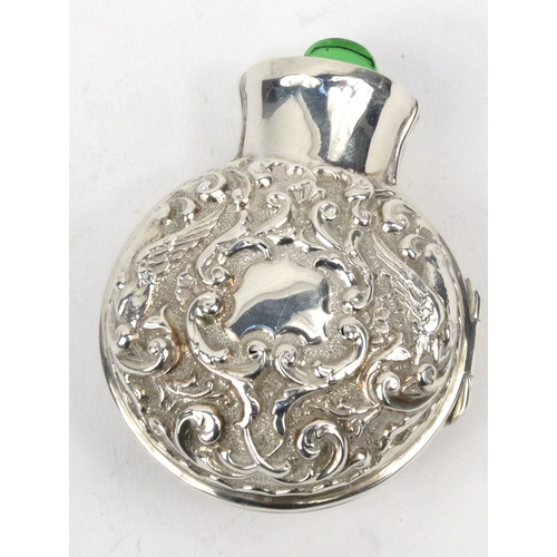 94 - Silver cased green glass scent bottle, indistinctly hallmark for London? 1927-28?, 7cm long