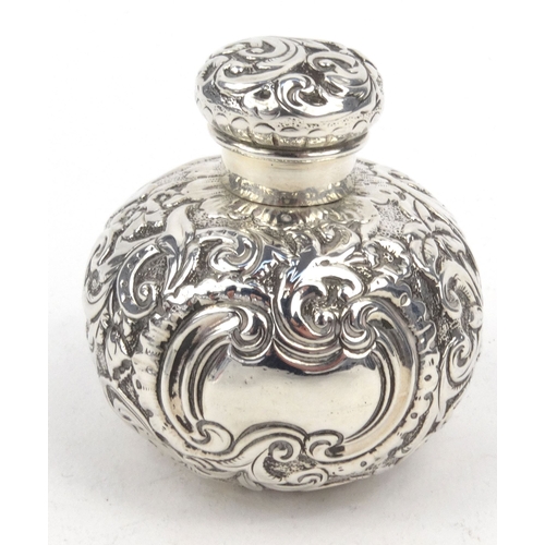 91 - Globular silver scent bottle with embossed decoration, indistinct Birmingham hallmark, 5.5cm high