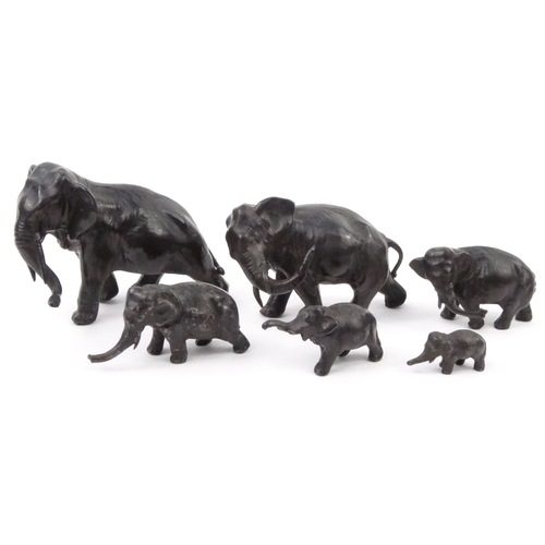 577 - Group of oriental cast metal elephants, some with character marks to the base, the largest 16cm diam... 