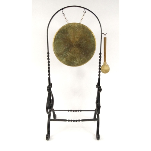 57 - Brass gong with wrought iron stand, 89cm high