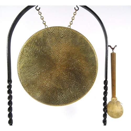 57 - Brass gong with wrought iron stand, 89cm high
