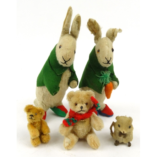 541 - Two miniature jointed teddy bears and two Peter Rabbit soft toys and felt mouse with paper label, th... 