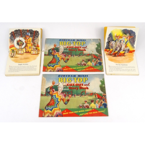 528 - Two Bertram Mills Big Top cut-out and story books, together with two circus pop-up picture books - A... 