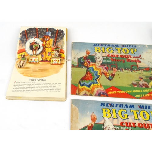 528 - Two Bertram Mills Big Top cut-out and story books, together with two circus pop-up picture books - A... 