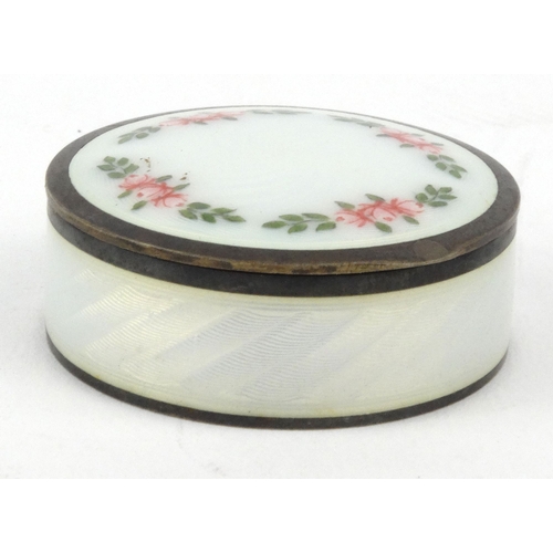 40 - 925 grade silver and guilloche enamel pill box with floral decoration, 1.5cm high
