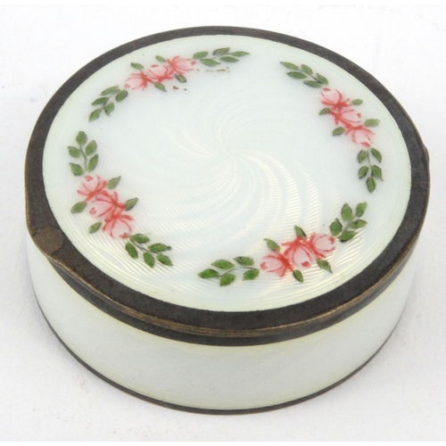 40 - 925 grade silver and guilloche enamel pill box with floral decoration, 1.5cm high
