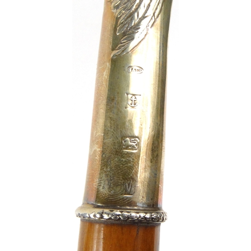142 - Wooden walking stick with dog design silver handle, hallmarked Birmingham 1987, 88cm long