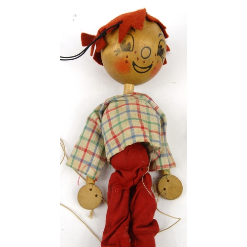 563 - Two wooden Pelham puppets, each 23cm high