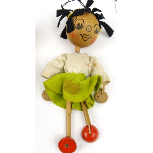 563 - Two wooden Pelham puppets, each 23cm high