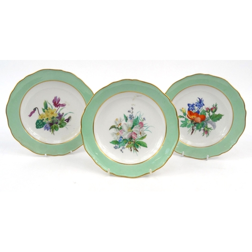 731 - Three Meissen plates hand painted with a floral decoration, crossed swords marks to the base, each 2... 