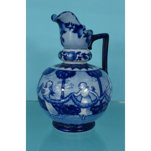 2085 - Doulton Burslem blue and white ewer decorated with girls and birds, 17cm high