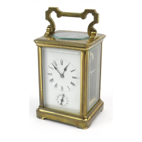 1304 - Victorian brass carriage clock striking on a gong, with original leather carrying case, 12cm high ex... 