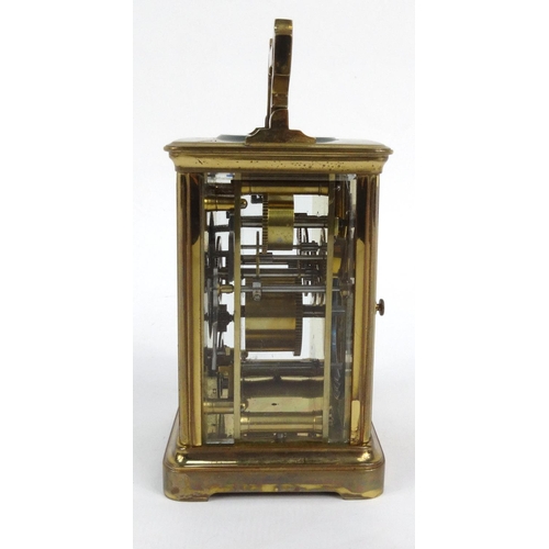 1304 - Victorian brass carriage clock striking on a gong, with original leather carrying case, 12cm high ex... 