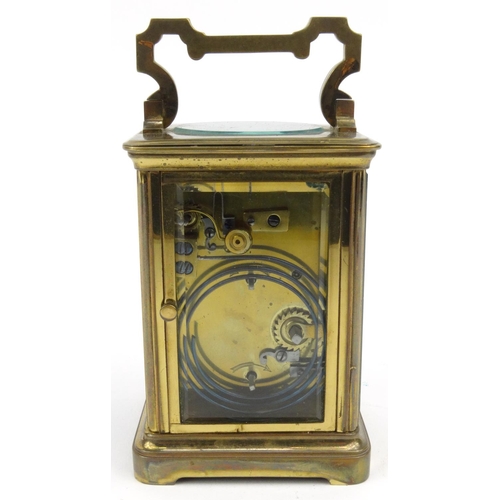 1304 - Victorian brass carriage clock striking on a gong, with original leather carrying case, 12cm high ex... 