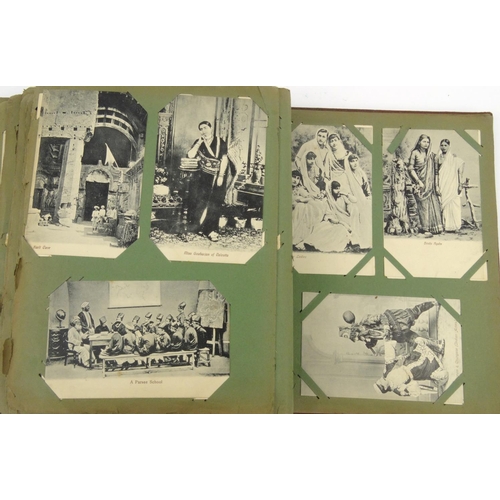 247 - Album of Indian postcards including musicians, Indian and native wrestlers, bazaars, etc