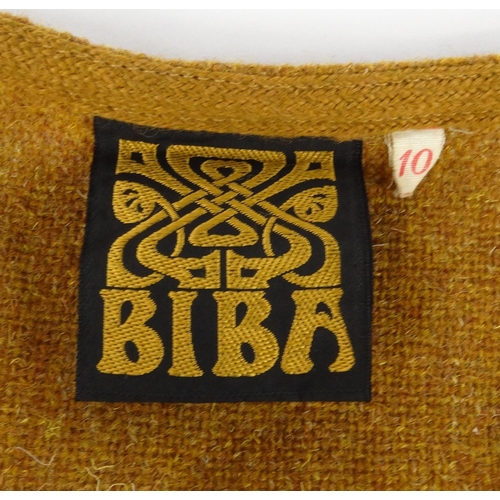 170 - Three Vintage 1960s Biba items of clothing comprising two size 10 tweed waistcoats and a floral blou... 