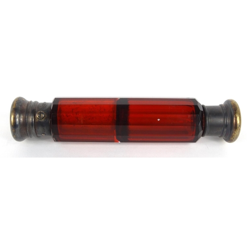 213 - Victorian ruby glass double scent bottle with gilt metal caps, 14.5cm long