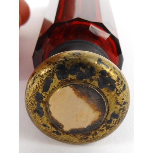 213 - Victorian ruby glass double scent bottle with gilt metal caps, 14.5cm long