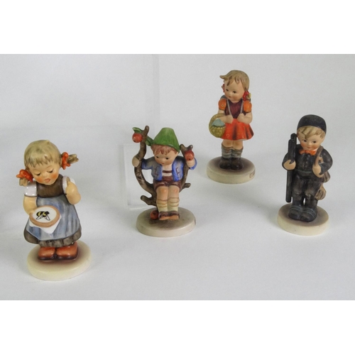 121 - Group of 12 hand painted Goebel Hummel figures including Appletree Boy, Schoolgirl, Wayside Harmony,... 