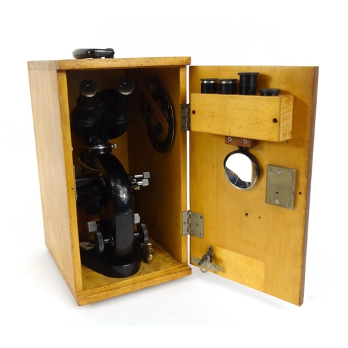 15 - Russian microscope with extra lenses including some C. Baker of London examples, housed in a fitted ... 