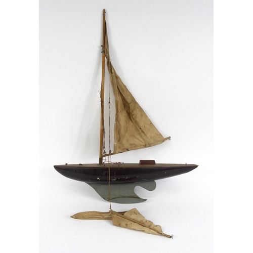 602 - Old wooden pond yacht with cloth sale, 61cm long