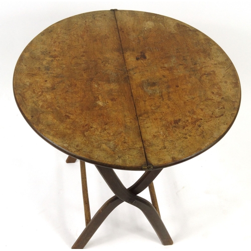 51 - Circular burr walnut folding picnic table, 64cm high x 63cm diameter